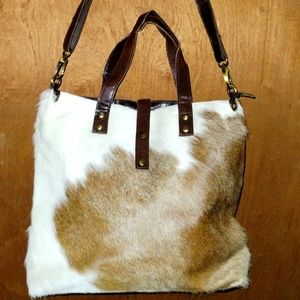 Cow hair on leather tote